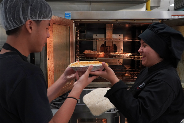 Culinary Arts Students Bake Pies for Teachers